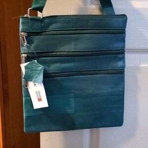 Genuine leather cross body purse.